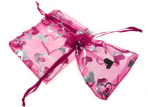 Organza zakje fuchsia met zilveren hartje print